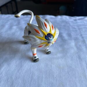 Pokemon Figurine with Orange Accents